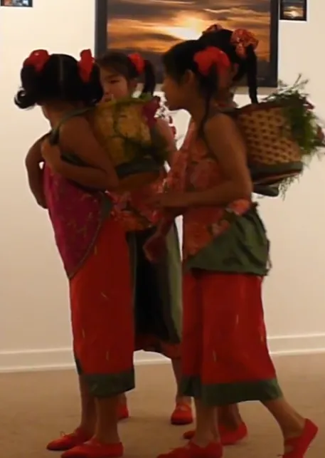Amy in a dance costume with her dance group